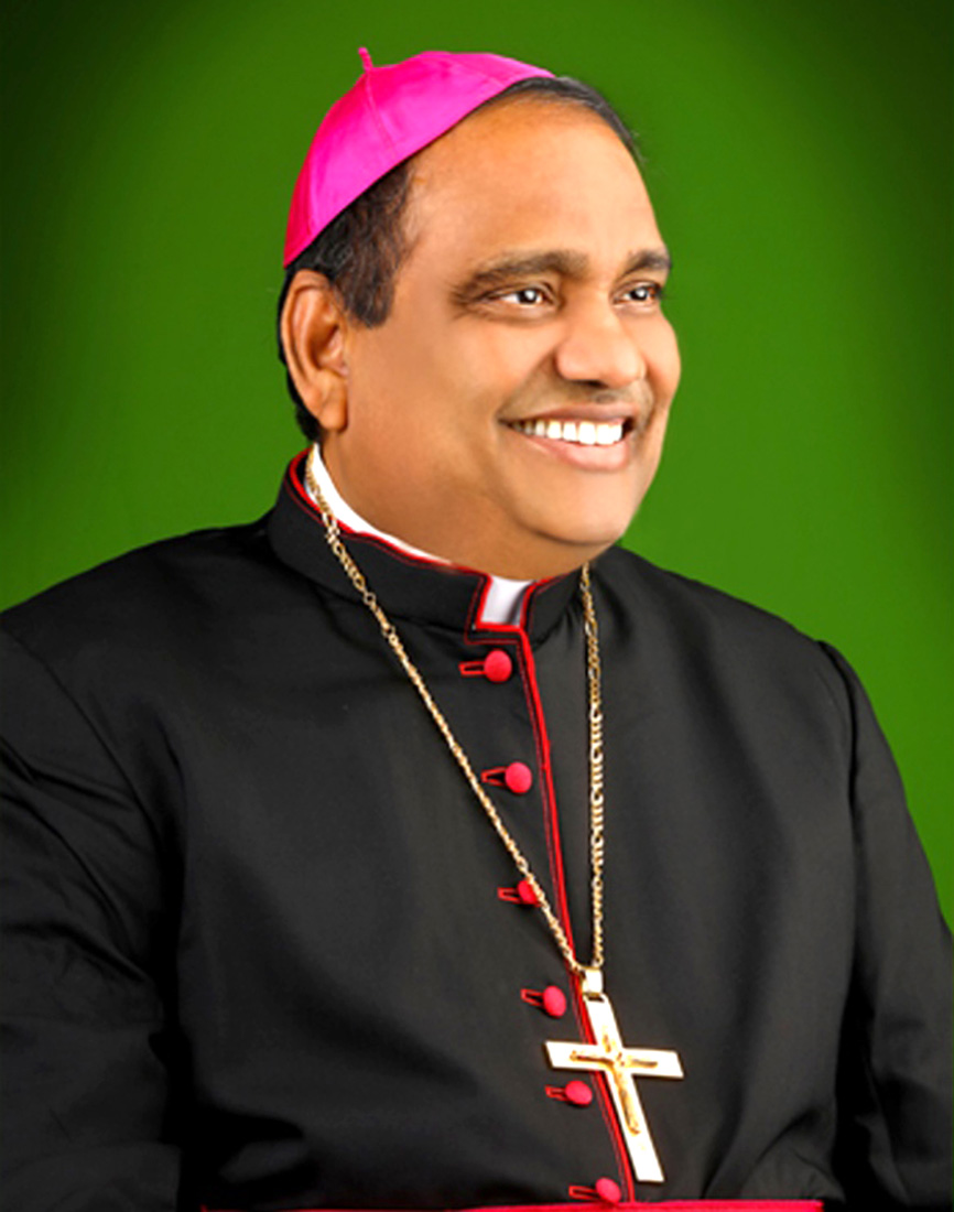 Fr. Suresh Mathew in conversation with Archbishop Poola Anthony